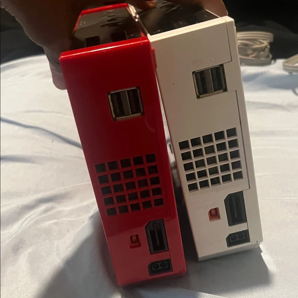 2 nintendo switches for 80 feel the old games got every cord